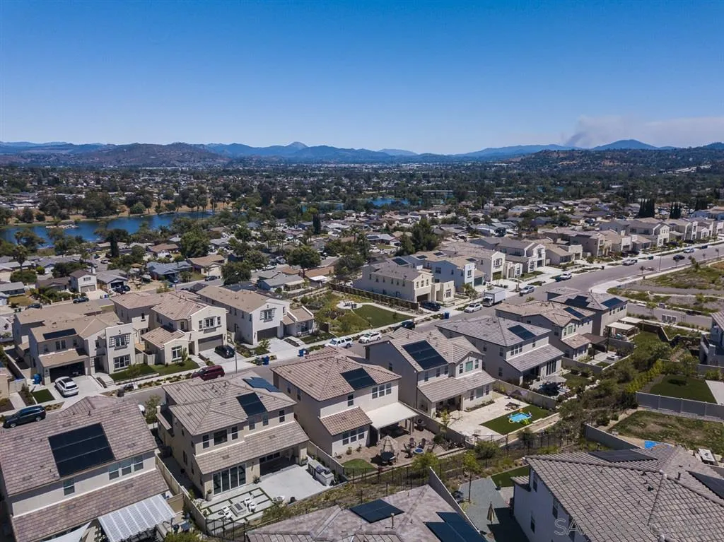 8828 Weston Road Santee, CA 92071 - Photo 3 of 25 an aerial view of residential houses with outdoor space and trees