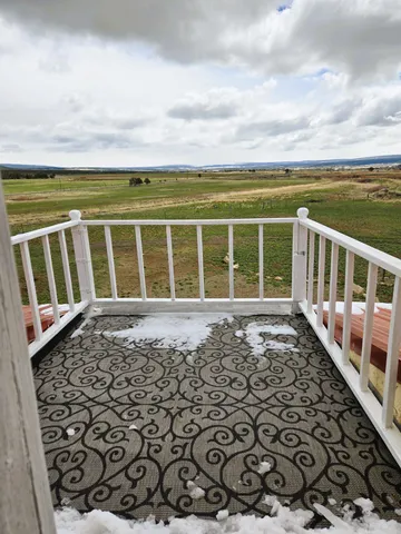 a view of backyard of a house