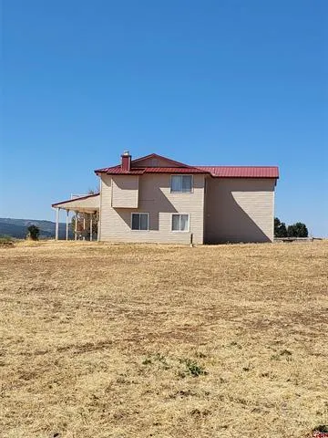 a view of an ocean and mountain