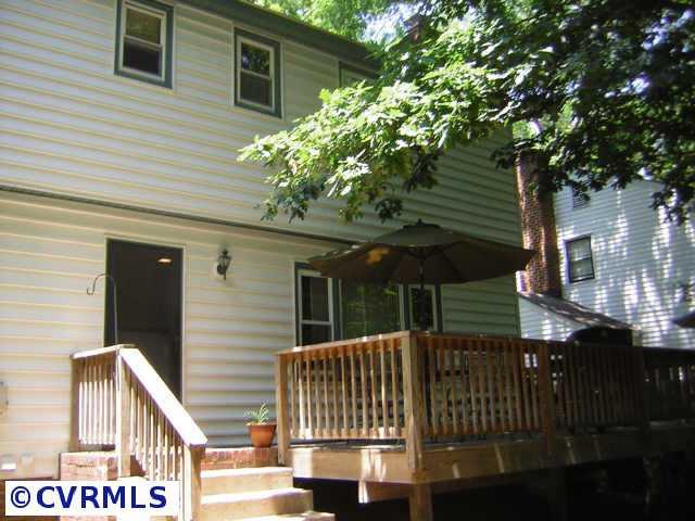 2001 Esquire Road Richmond, VA 23235 - Photo 9 of 10 a view of a house with a tree