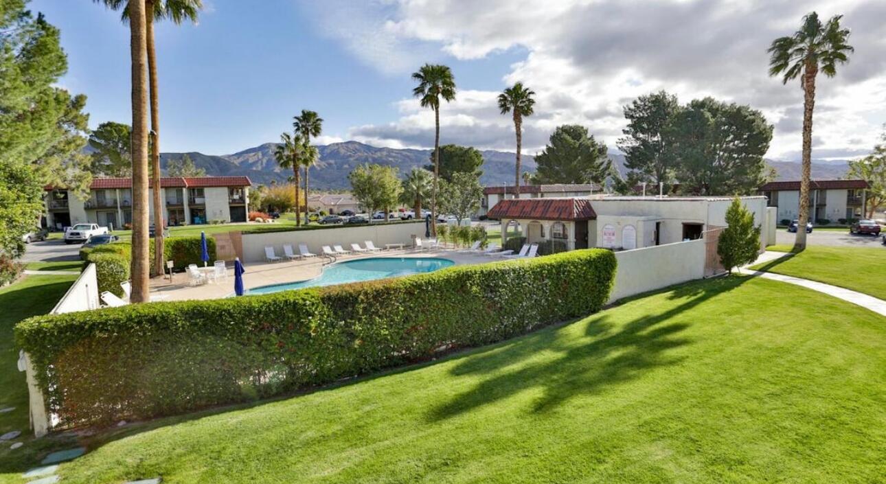 64291 Spyglass Avenue, Unit 2 Desert Hot Springs, CA 92240 - Photo 19 of 22 an aerial view of a house with swimming pool garden and patio