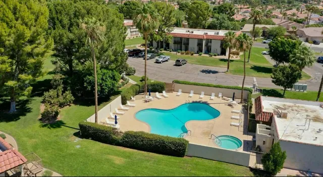 an aerial view of a house having yard