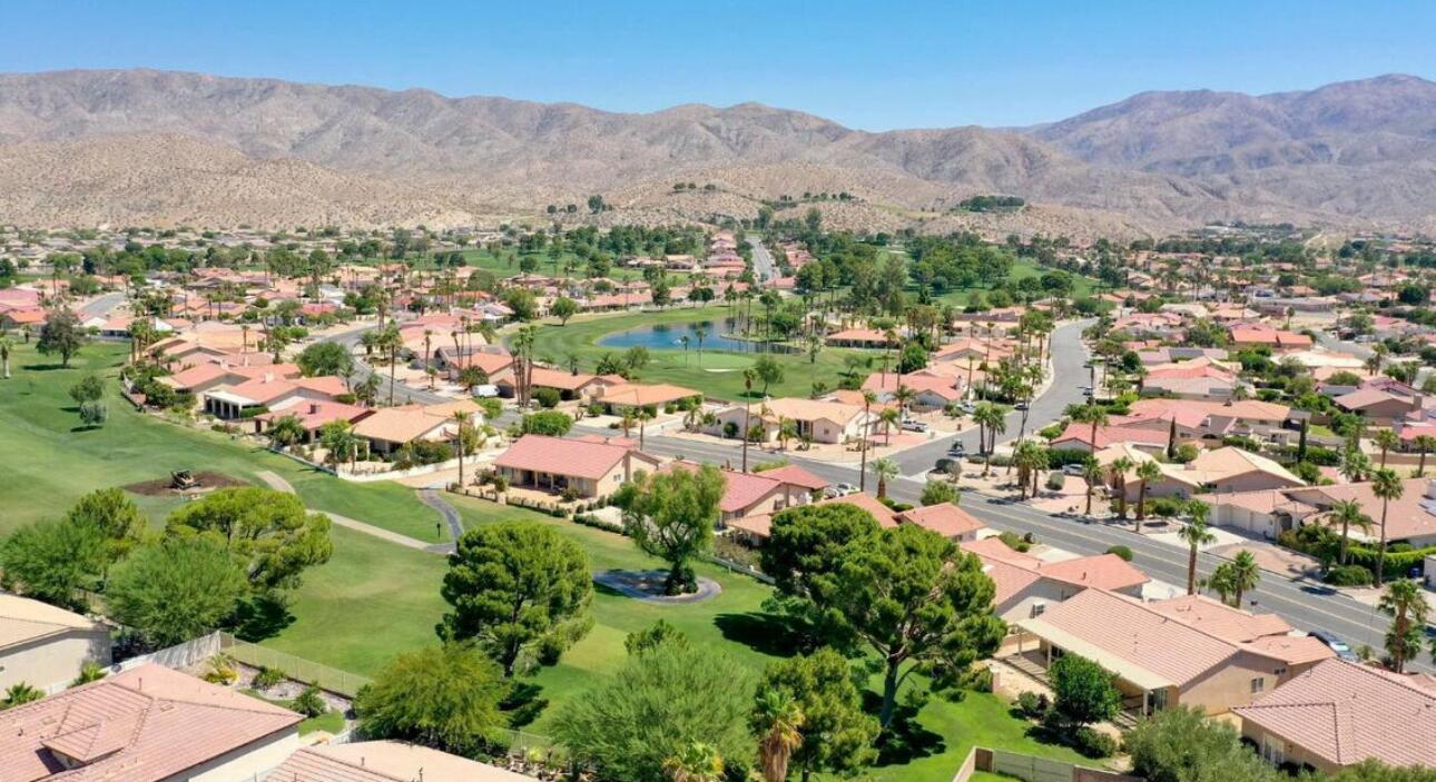 64291 Spyglass Avenue, Unit 2 Desert Hot Springs, CA 92240 - Photo 21 of 22 an aerial view of residential house with outdoor space and river
