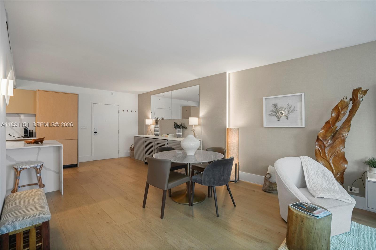 2301 Collins Avenue, Unit 407 Miami Beach, FL 33139 - Photo 17 of 48 a view of a livingroom with furniture and a workspace