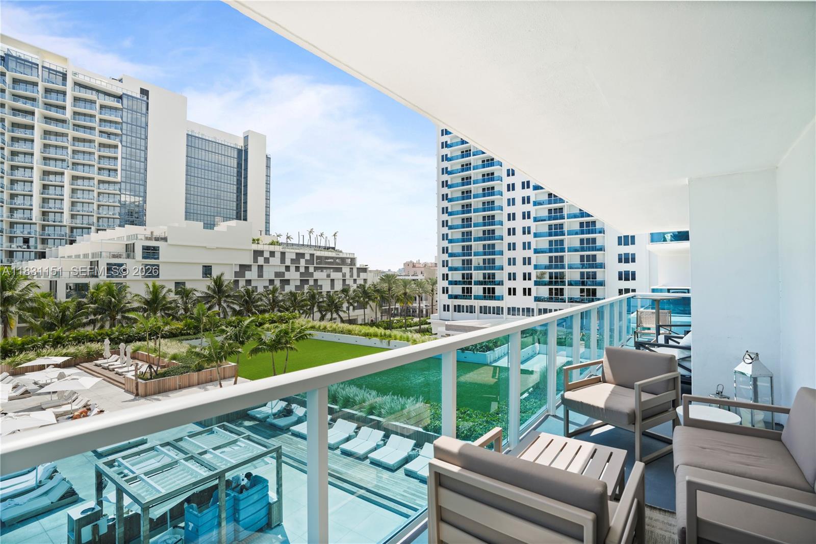 2301 Collins Avenue, Unit 407 Miami Beach, FL 33139 - Photo 39 of 48 a view of balcony with a couple of chairs