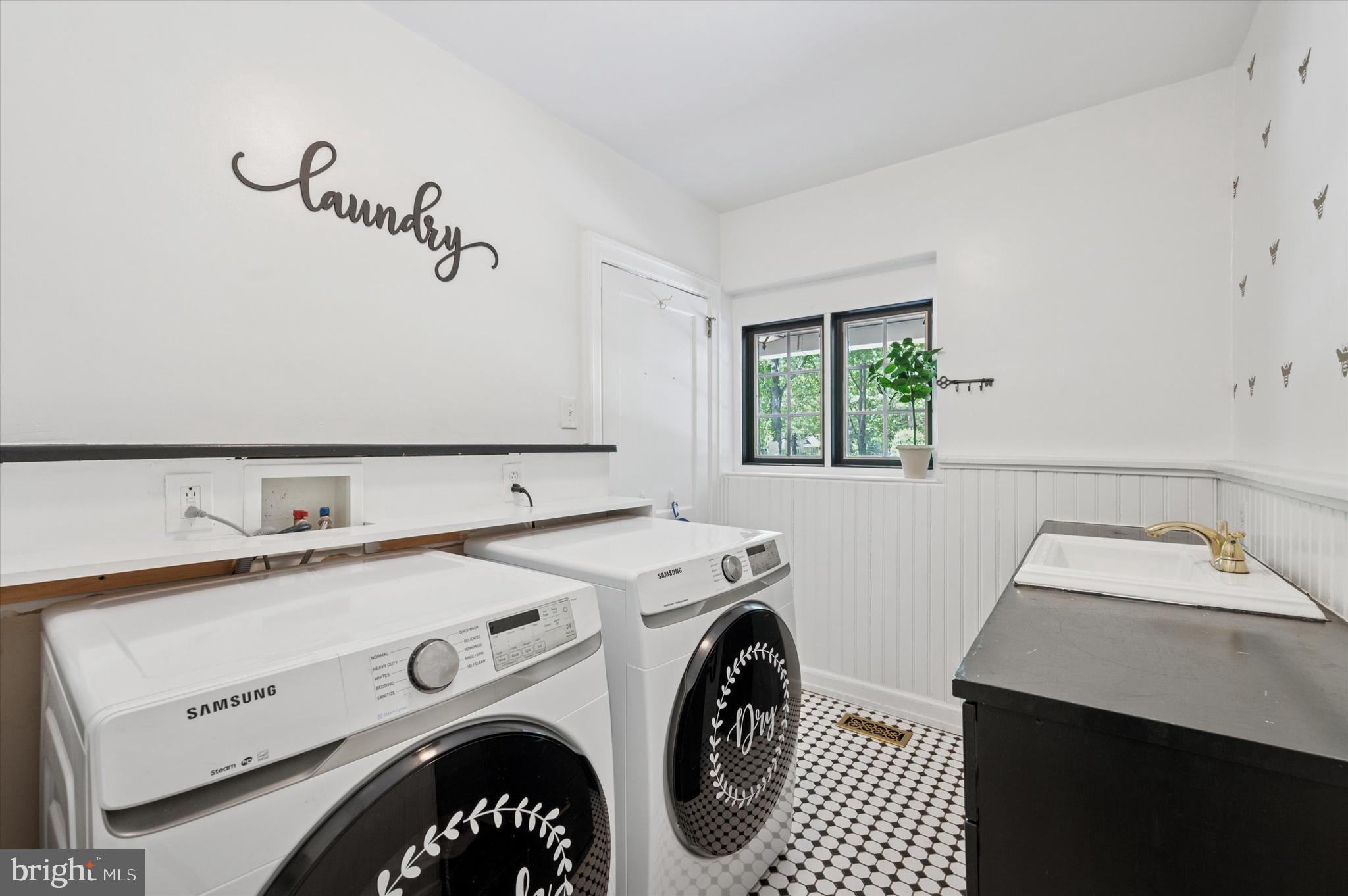 211 Ladbroke Road Bryn Mawr, PA 19010 - Photo 11 of 38 a utility room with dryer and washer