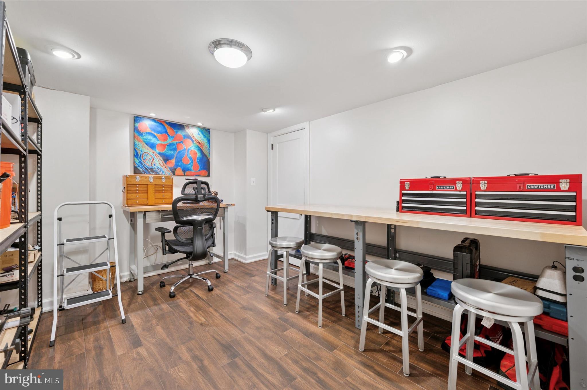 211 Ladbroke Road Bryn Mawr, PA 19010 - Photo 13 of 38 a view of a workspace with furniture and wooden floor