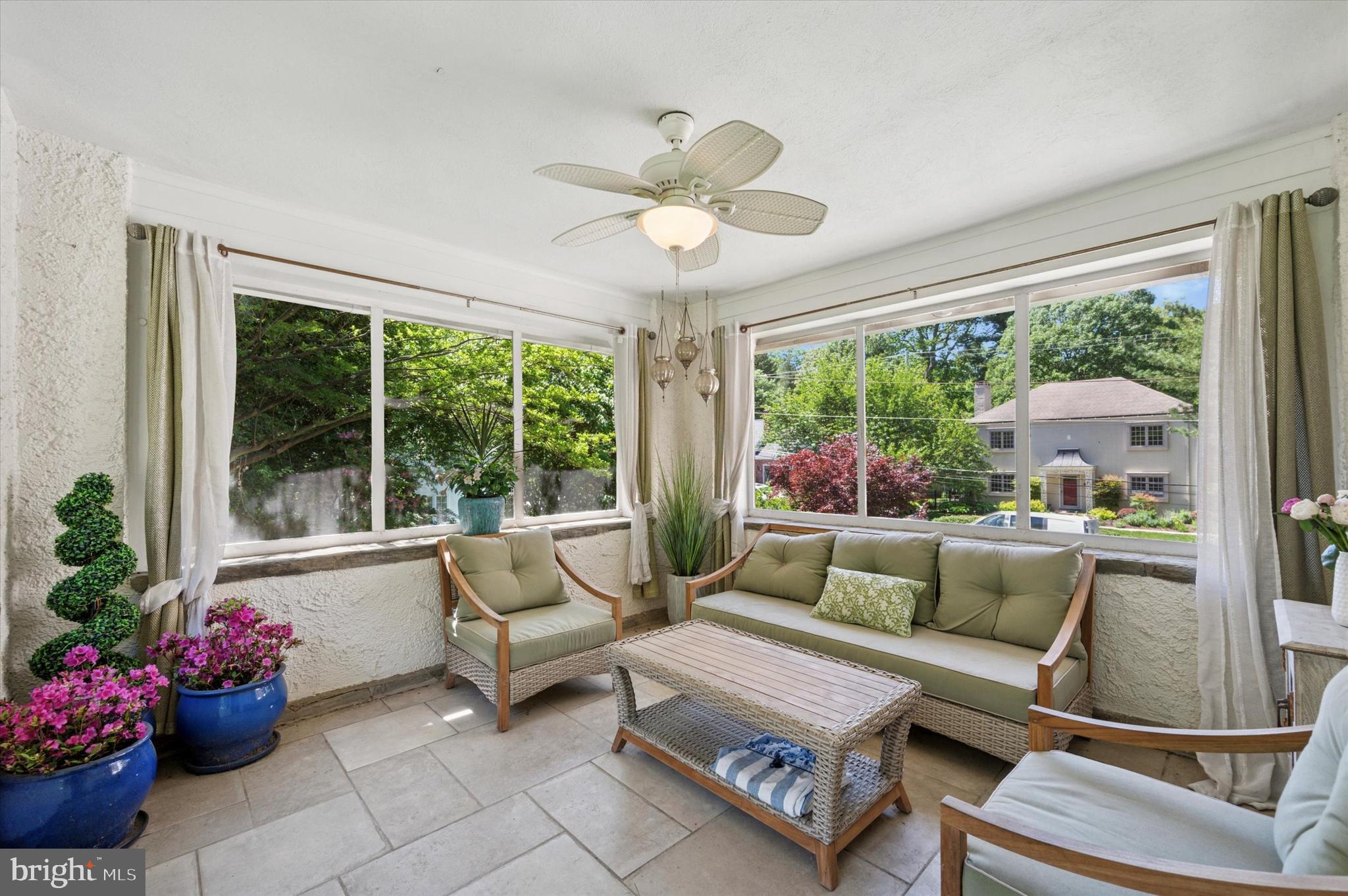 211 Ladbroke Road Bryn Mawr, PA 19010 - Photo 14 of 38 a living room with furniture and a large window