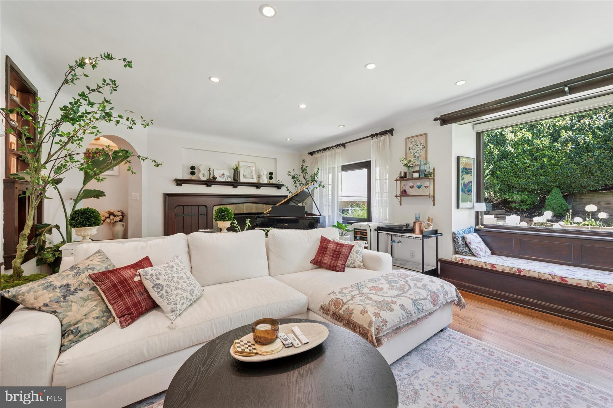 211 Ladbroke Road Bryn Mawr, PA 19010 - Photo 15 of 38 a living room with furniture and a large window