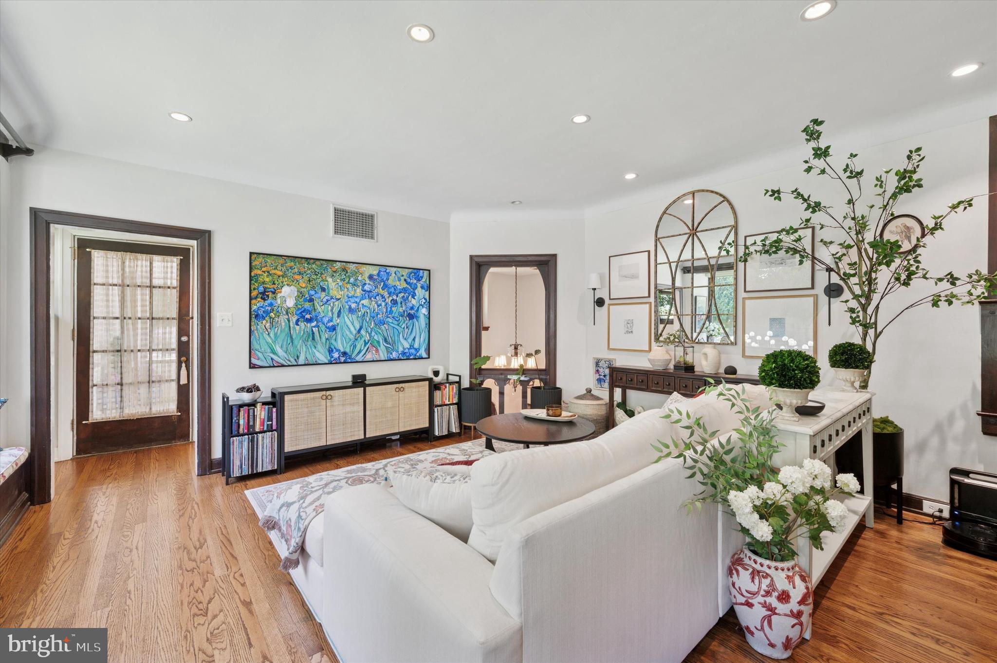 211 Ladbroke Road Bryn Mawr, PA 19010 - Photo 17 of 38 a living room with furniture fireplace and wooden floor