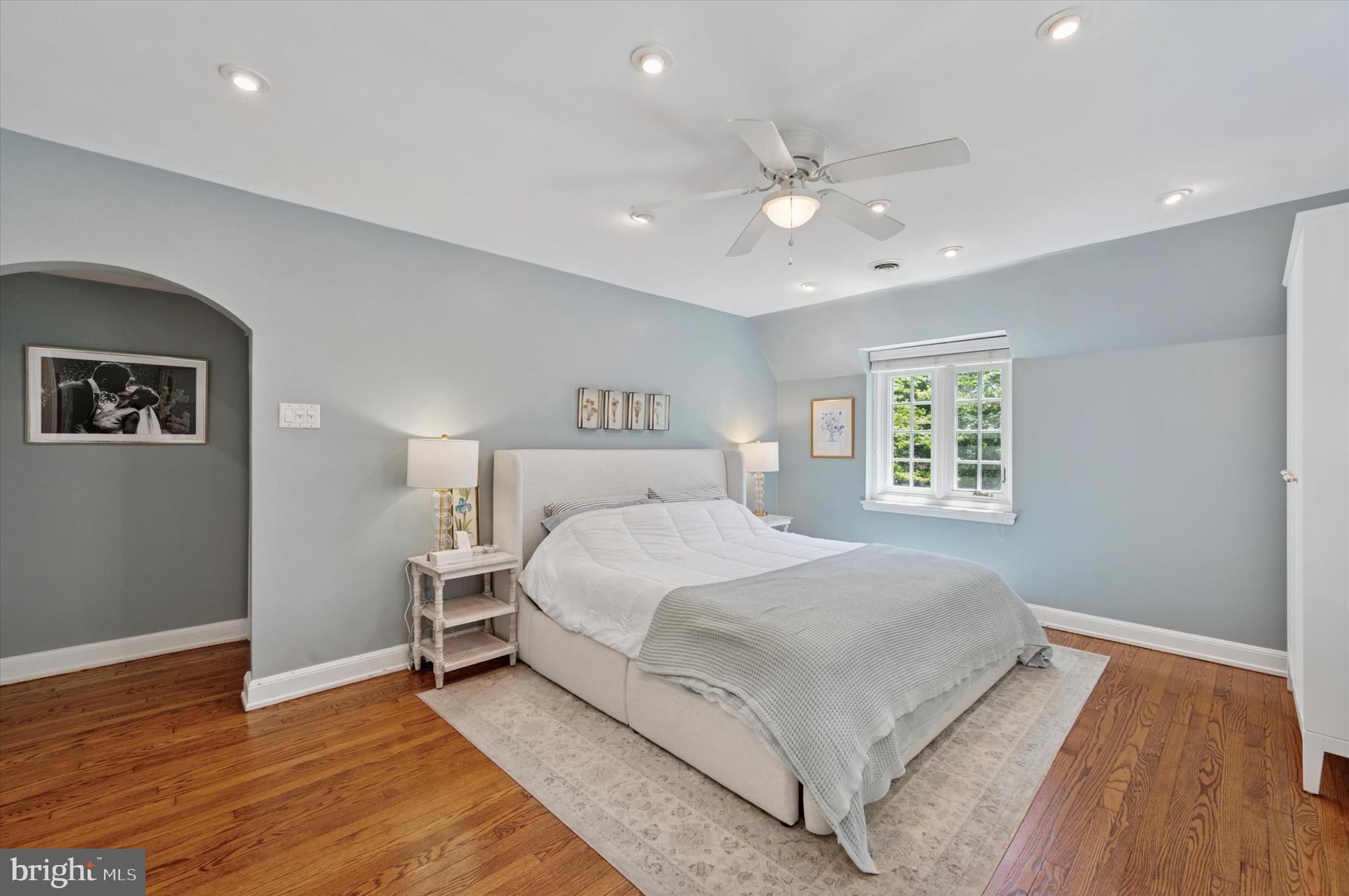 211 Ladbroke Road Bryn Mawr, PA 19010 - Photo 21 of 38 a bedroom with a large bed and a window