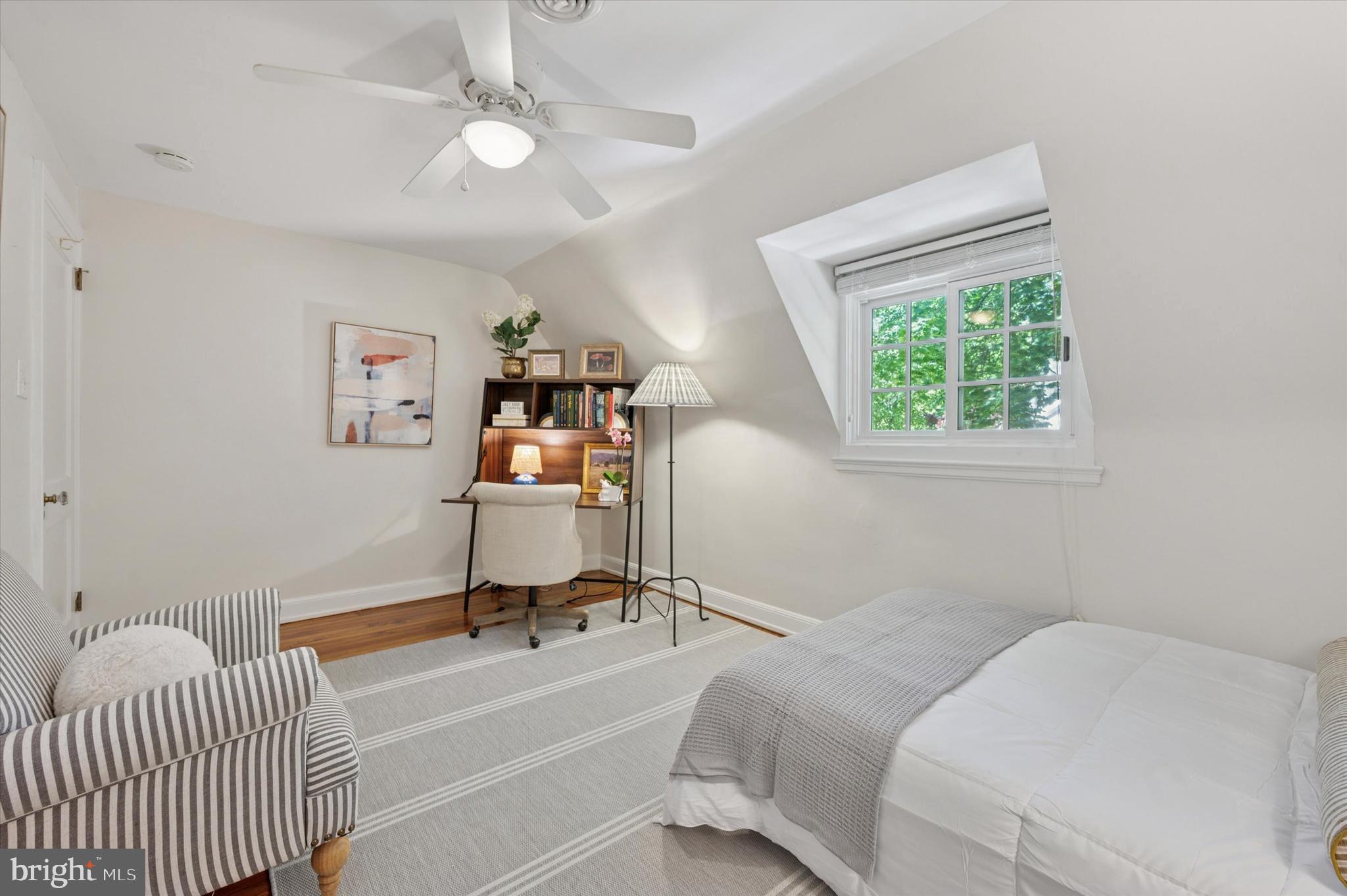 211 Ladbroke Road Bryn Mawr, PA 19010 - Photo 28 of 38 a room with a bed and a window