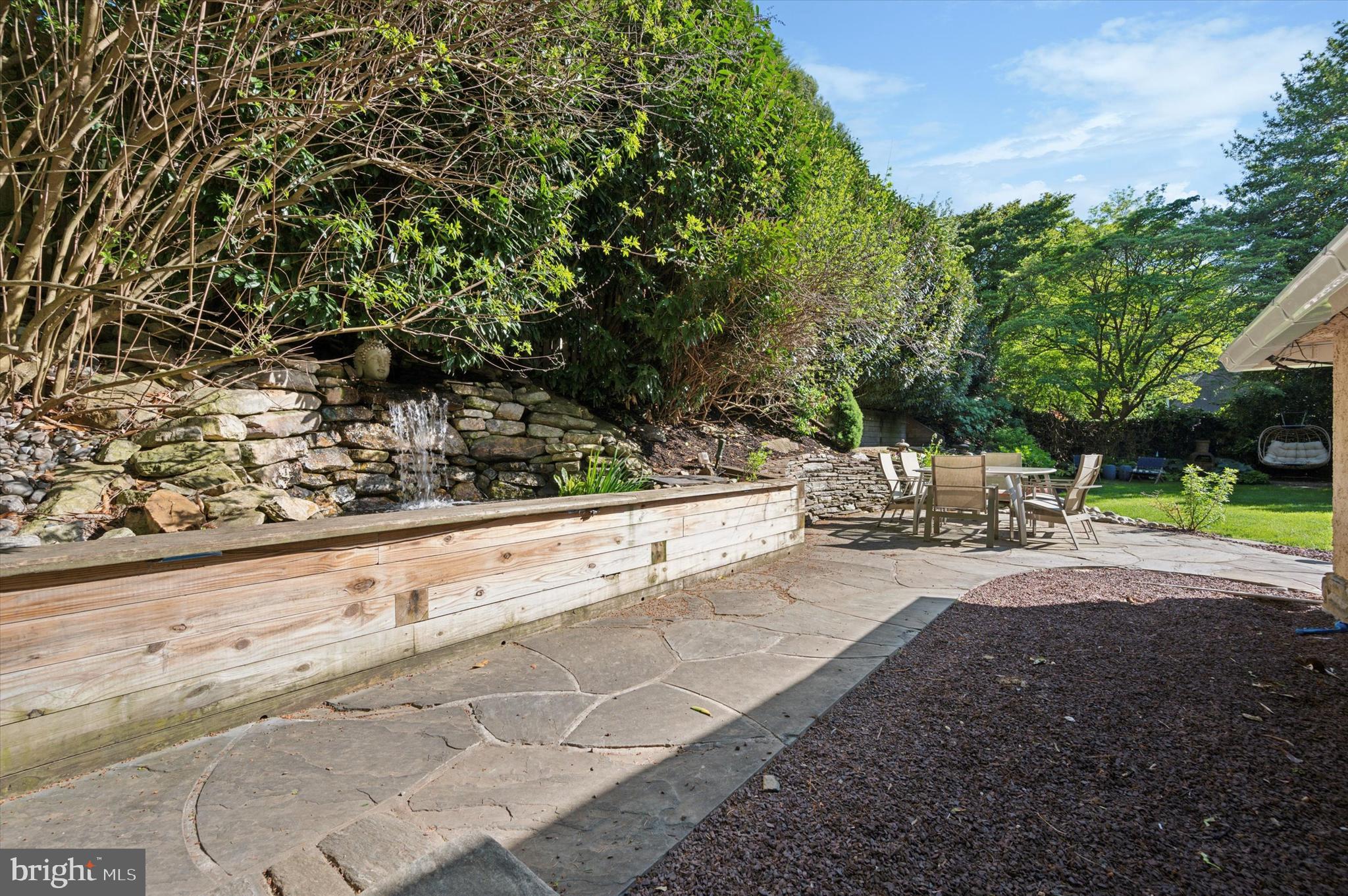 211 Ladbroke Road Bryn Mawr, PA 19010 - Photo 35 of 38 a view of swimming pool with lawn chairs and plants