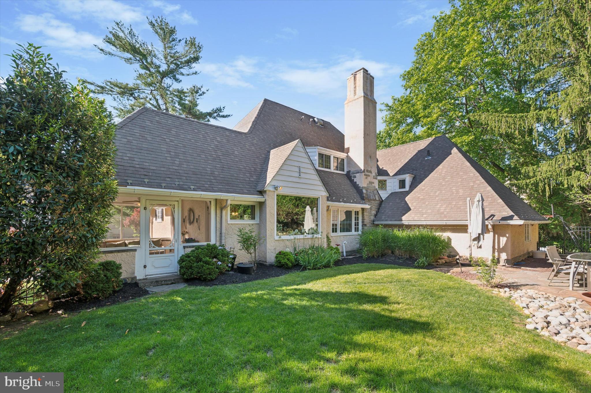 211 Ladbroke Road Bryn Mawr, PA 19010 - Photo 38 of 38 a front view of a house with garden