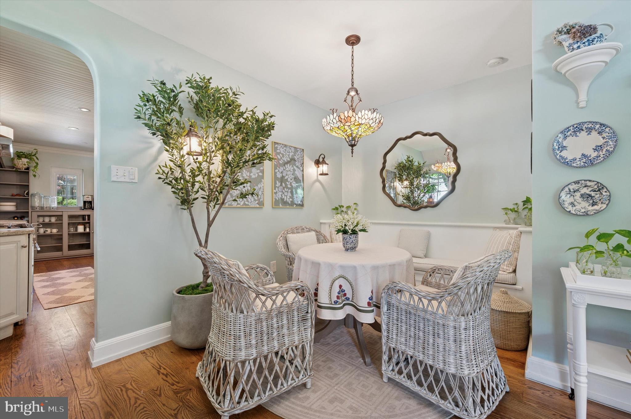 211 Ladbroke Road Bryn Mawr, PA 19010 - Photo 8 of 38 a living room with furniture a chandelier and a table