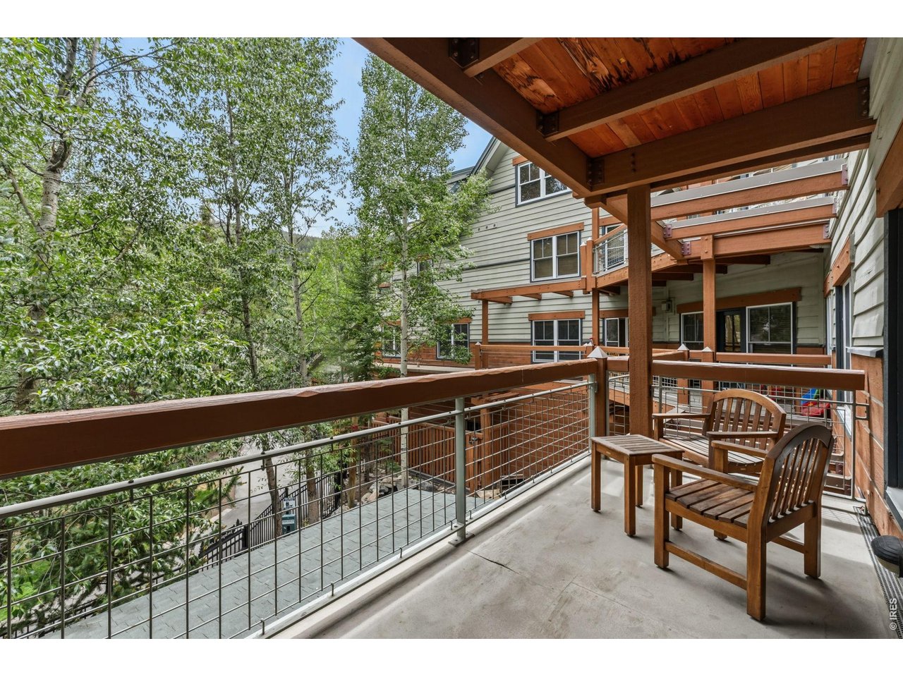 195 River Run Road, Unit 8006 Keystone, CO 80435 - Photo 21 of 33 Your own outdoor escape a private balcony overlooking the trees and river below.