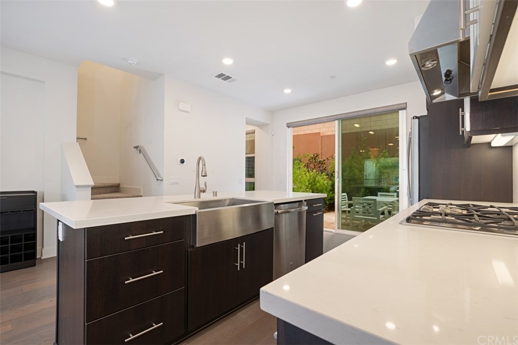 2771 Wright Lane Los Angeles, CA 90068 - Photo 16 of 31 a kitchen with a sink a stove and cabinets