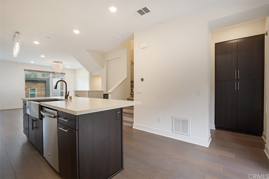 2771 Wright Lane Los Angeles, CA 90068 - Photo 17 of 31 a kitchen with a sink and a refrigerator