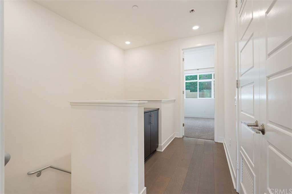 2771 Wright Lane Los Angeles, CA 90068 - Photo 26 of 31 a view of a hallway with wooden shelves
