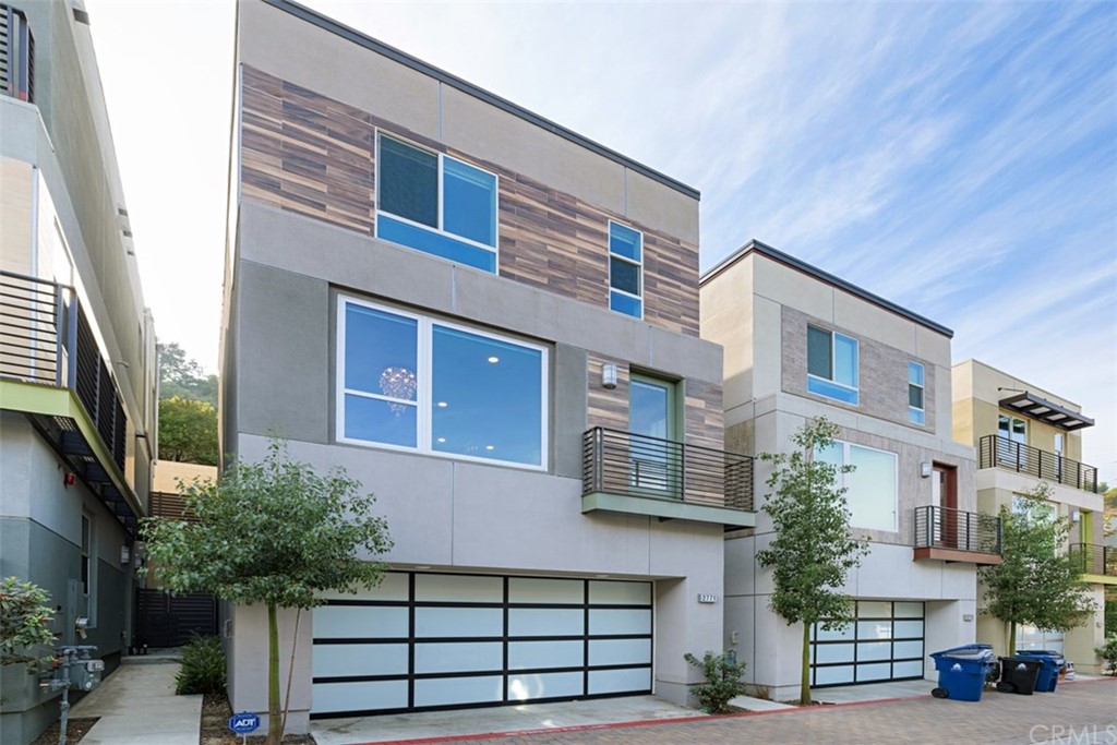 2771 Wright Lane Los Angeles, CA 90068 - Photo 3 of 31 a front view of a house with a street
