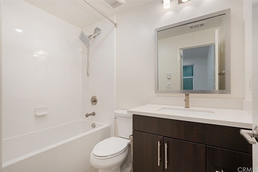 2771 Wright Lane Los Angeles, CA 90068 - Photo 10 of 31 a bathroom with a sink a toilet and shower