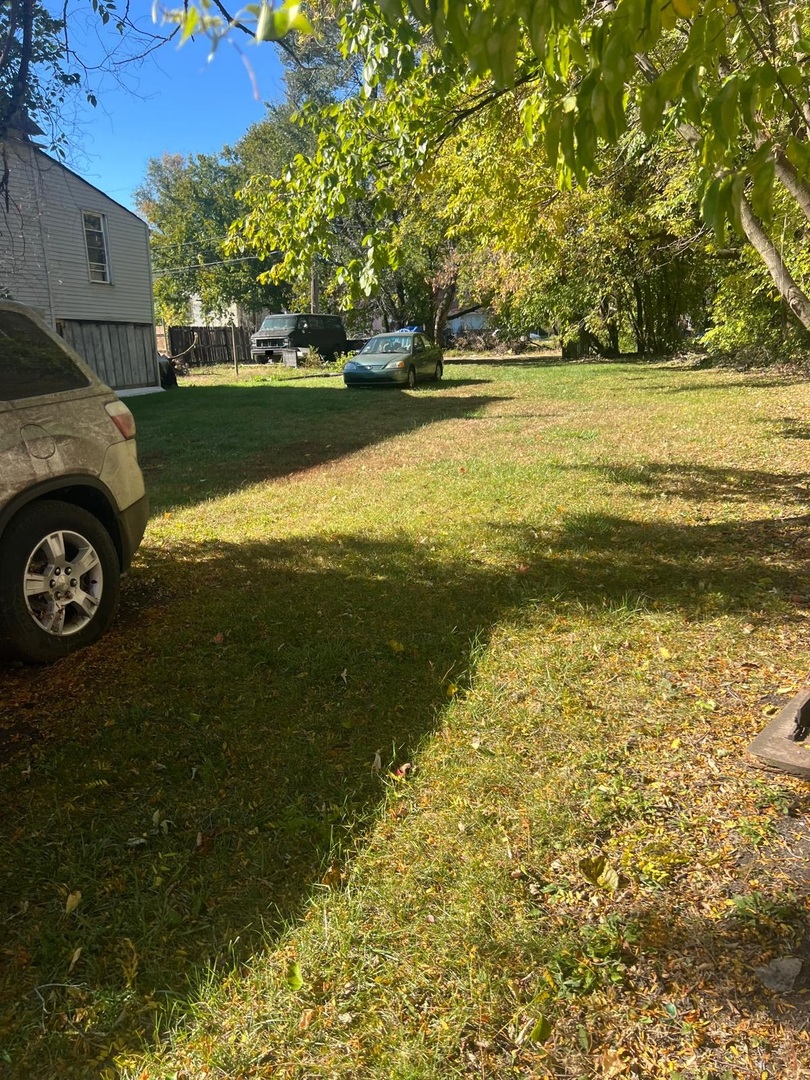 6824 South Honore Street Chicago, IL 60636 - Photo 6 of 6 a view of a yard with an outdoor space