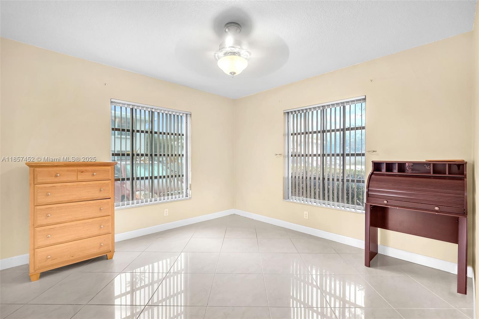 2171 Northeast 66th Street, Unit 801 Fort Lauderdale, FL 33308 - Photo 12 of 31 a view of an empty room with a window