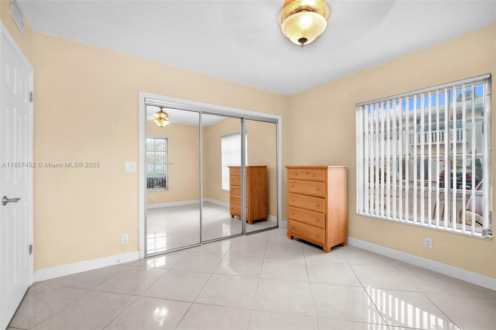 2171 Northeast 66th Street, Unit 801 Fort Lauderdale, FL 33308 - Photo 14 of 31 a view of an empty room with closet area