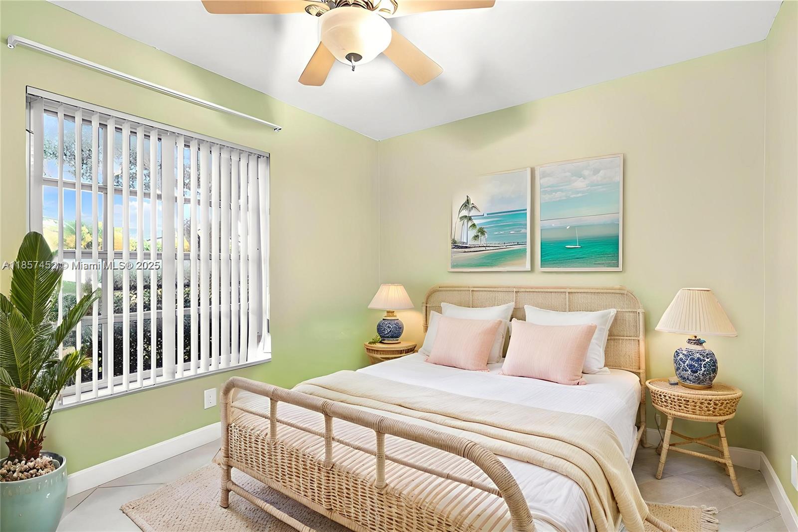 2171 Northeast 66th Street, Unit 801 Fort Lauderdale, FL 33308 - Photo 15 of 31 a bedroom with a bed and a window