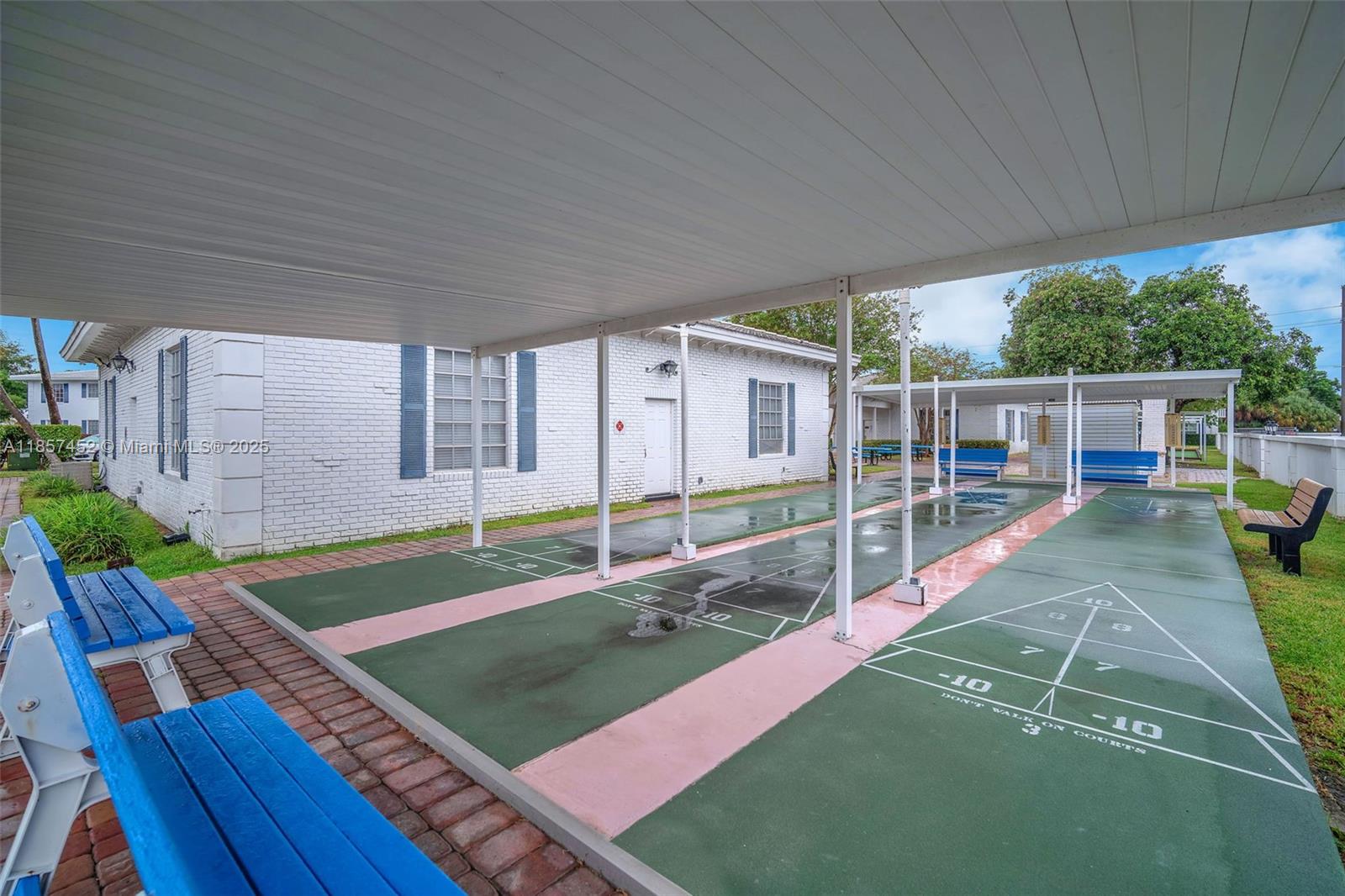 2171 Northeast 66th Street, Unit 801 Fort Lauderdale, FL 33308 - Photo 22 of 31 a view of a house with backyard and porch