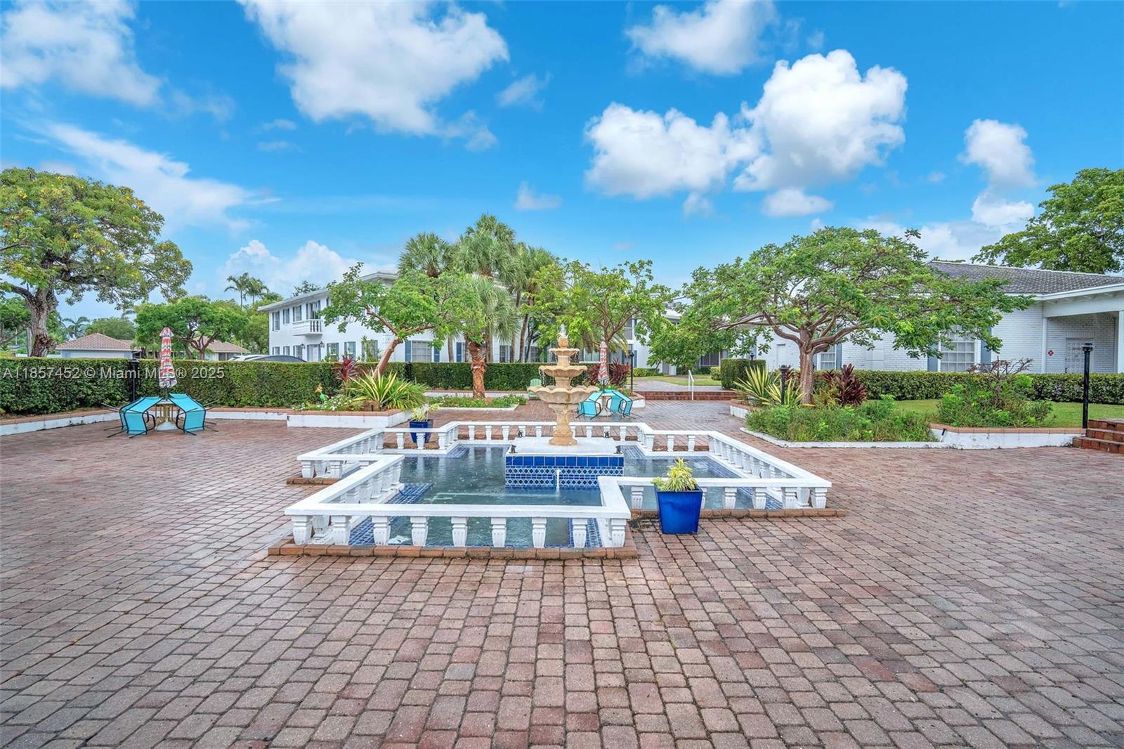 2171 Northeast 66th Street, Unit 801 Fort Lauderdale, FL 33308 - Photo 24 of 31 a view of a fountain in the front of a building