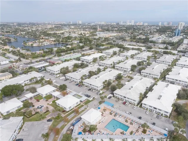 an aerial view of residential building with parking space