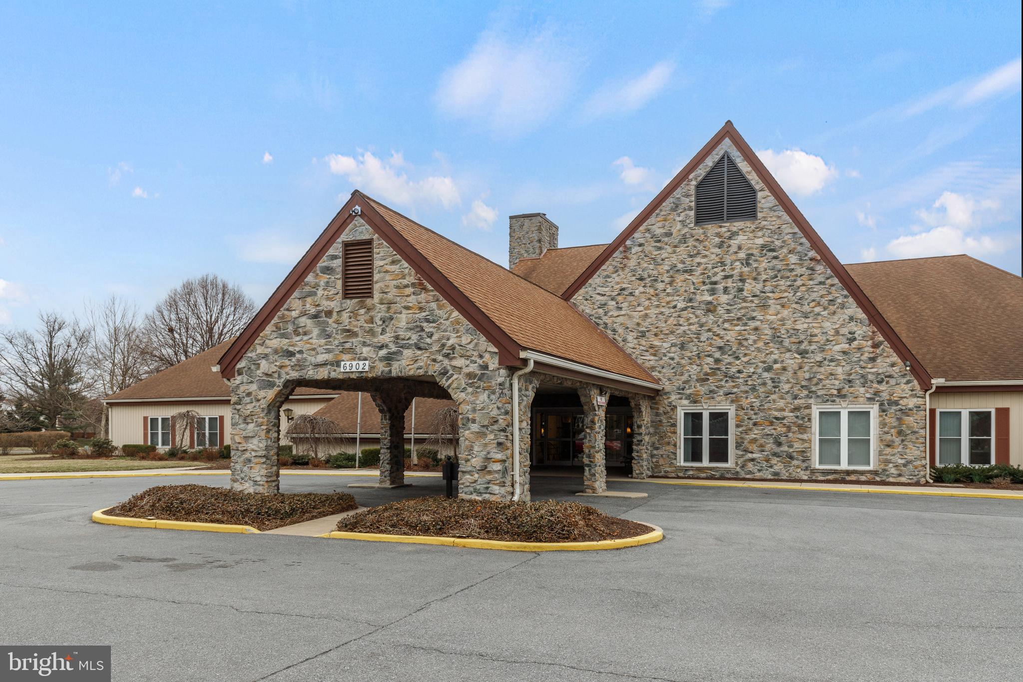 5669 Crabapple Drive Frederick, MD 21703 - Photo 17 of 24 a front view of a house with a garden