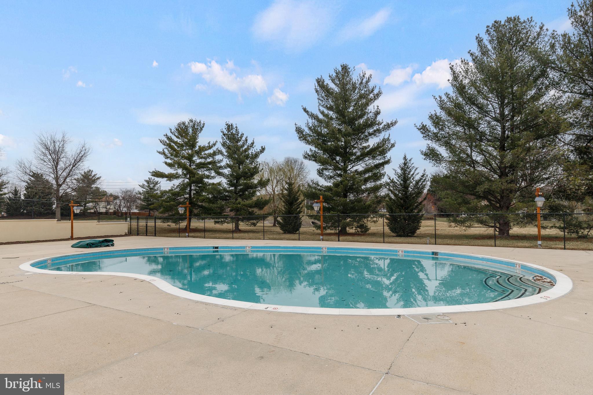5669 Crabapple Drive Frederick, MD 21703 - Photo 21 of 24 a view of swimming pool with a yard