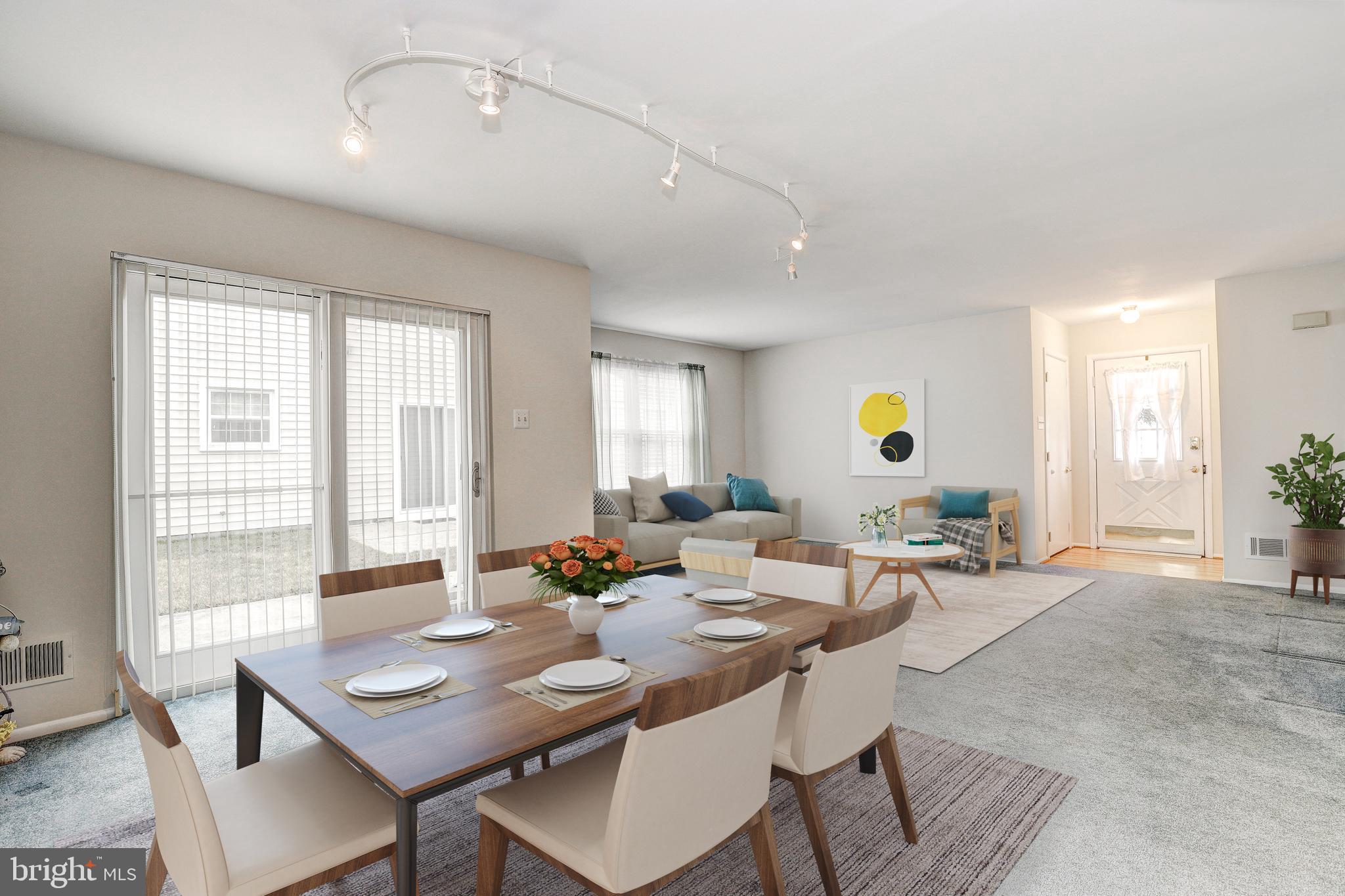 5669 Crabapple Drive Frederick, MD 21703 - Photo 3 of 24 a view of a dining room with furniture and window