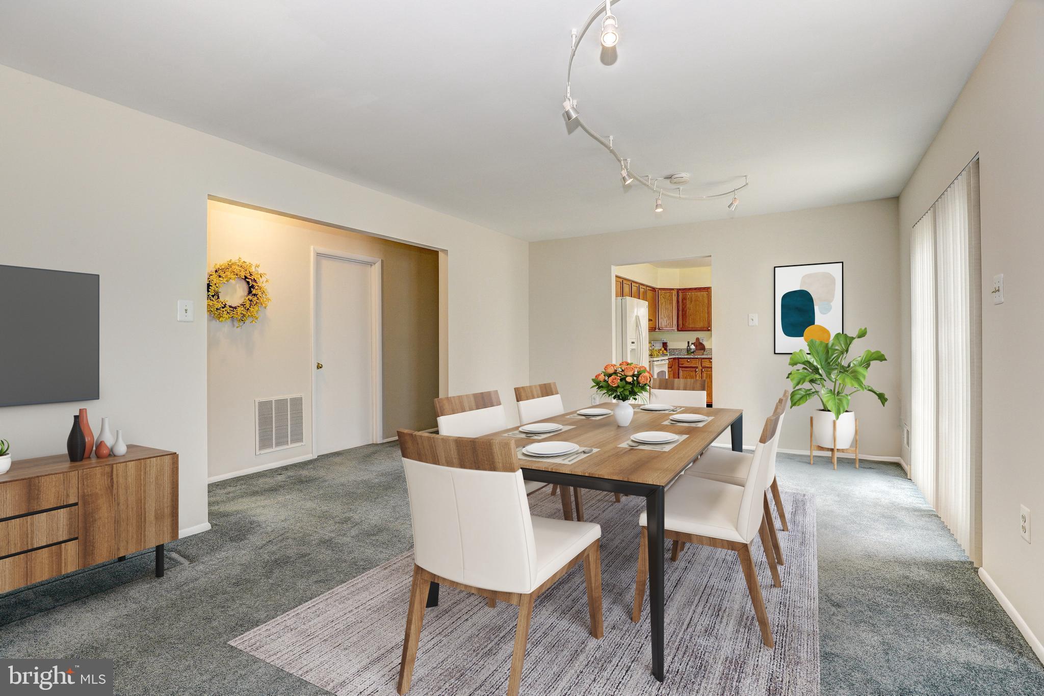 5669 Crabapple Drive Frederick, MD 21703 - Photo 4 of 24 a view of a dining room with furniture