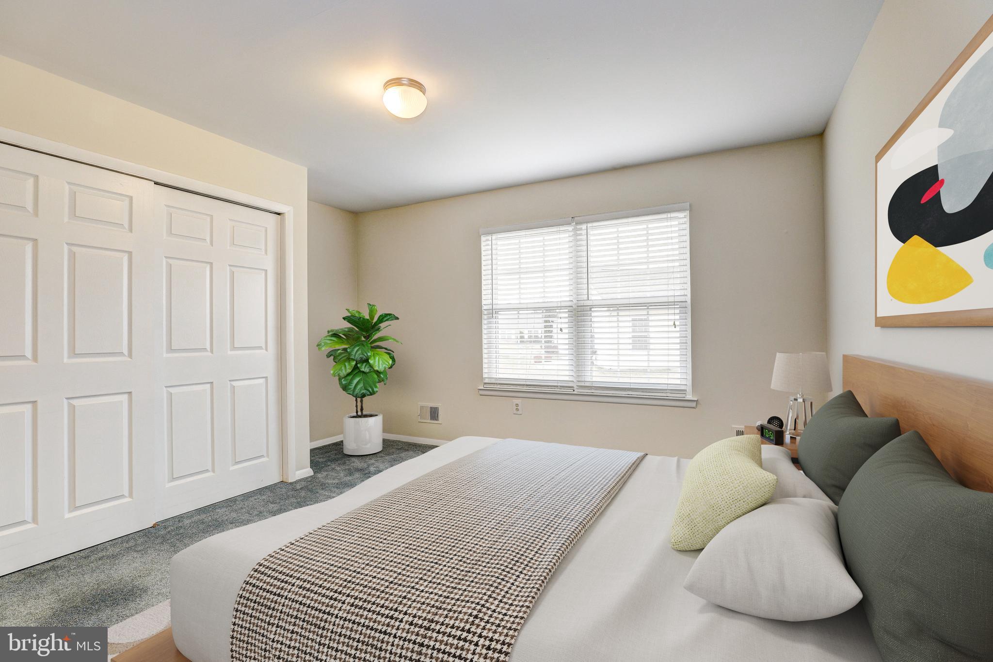 5669 Crabapple Drive Frederick, MD 21703 - Photo 9 of 24 a bedroom with a bed and a window