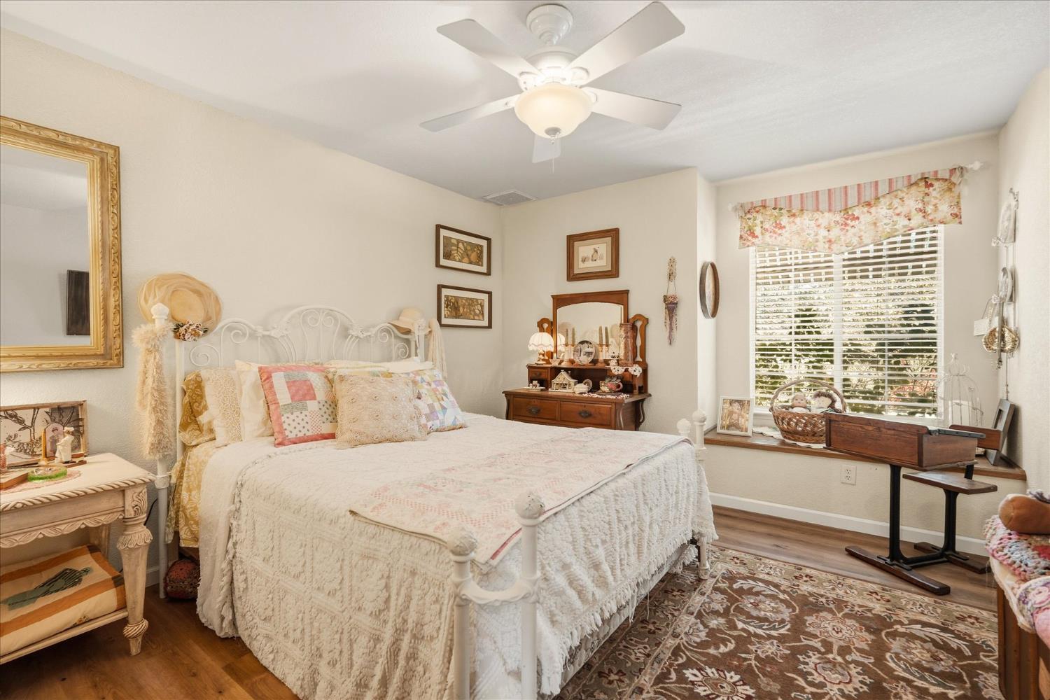 32583 River Knolls Road Coarsegold, CA 93614 - Photo 37 of 63 a bedroom with a bed and a couch