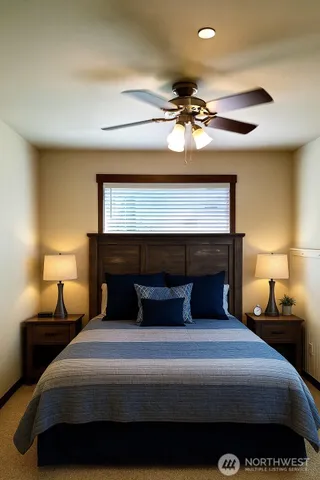 a bedroom with a bed and a ceiling fan