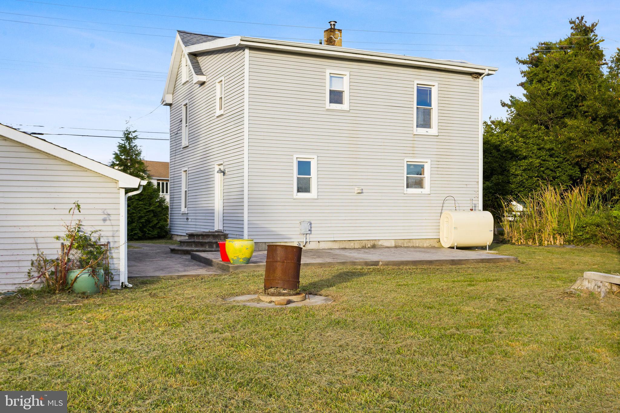 418 Jacobstown Cookstown Road Wrightstown, NJ 08562 - Photo 29 of 30 a backyard of a house with table and chairs