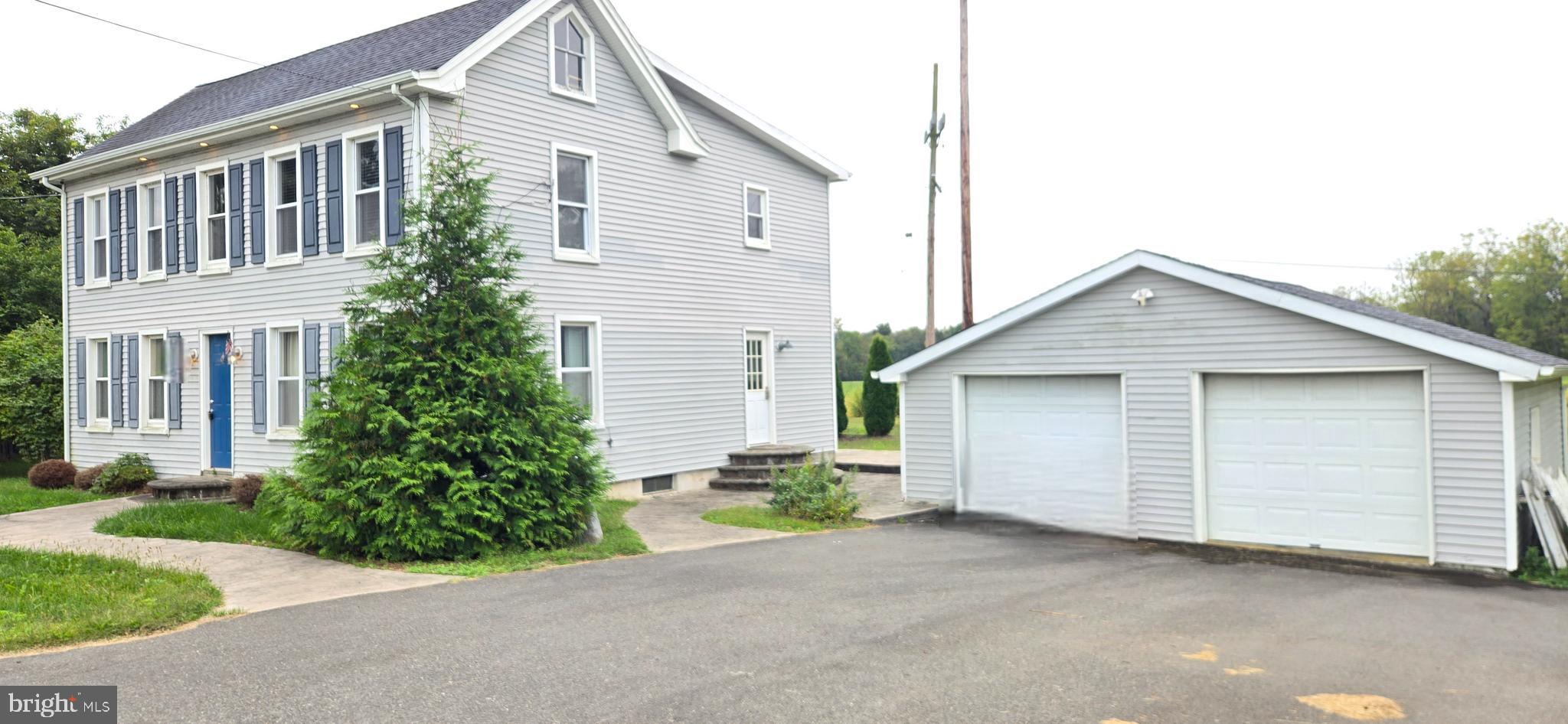 418 Jacobstown Cookstown Road Wrightstown, NJ 08562 - Photo 4 of 30 a view of a house with a yard and garage