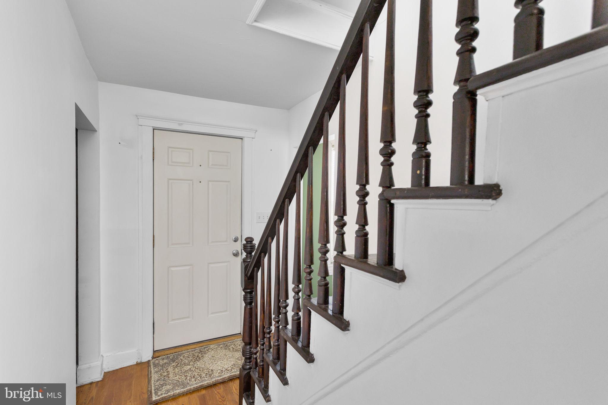 418 Jacobstown Cookstown Road Wrightstown, NJ 08562 - Photo 6 of 30 a view of staircase with wooden floor and white walls