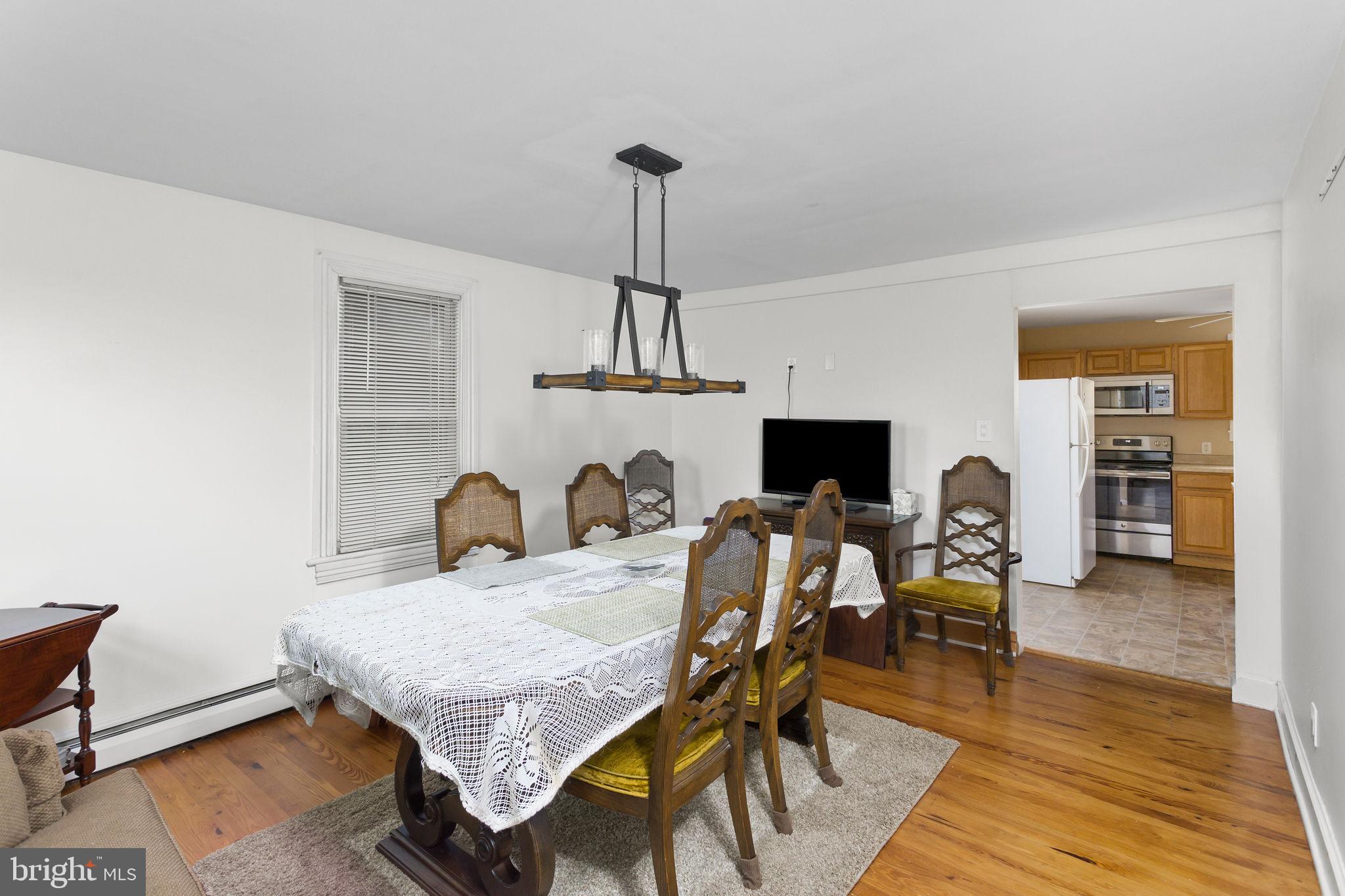 418 Jacobstown Cookstown Road Wrightstown, NJ 08562 - Photo 8 of 30 a living room with furniture and a fireplace