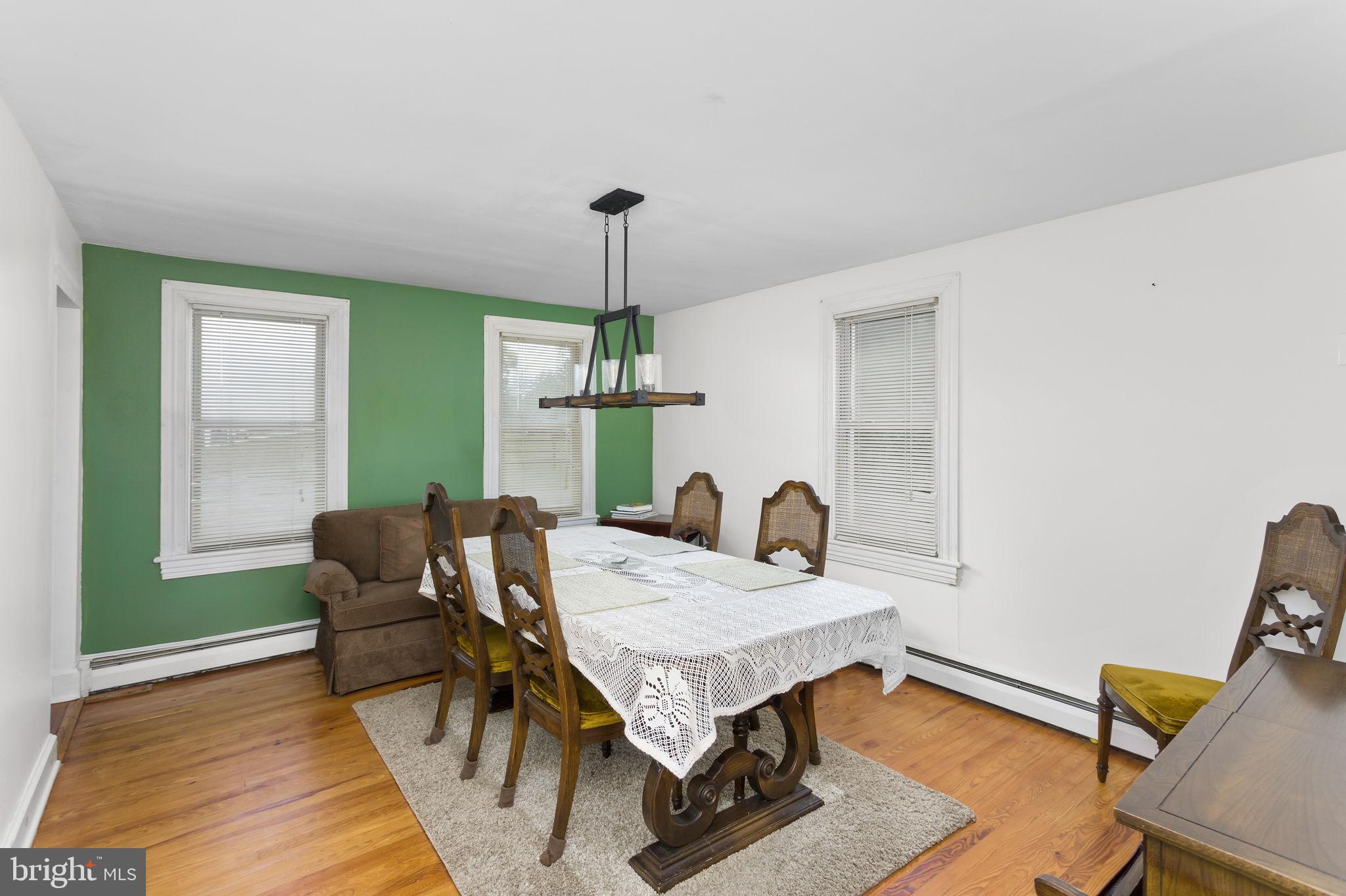 418 Jacobstown Cookstown Road Wrightstown, NJ 08562 - Photo 9 of 30 a living room with furniture and a wooden floor