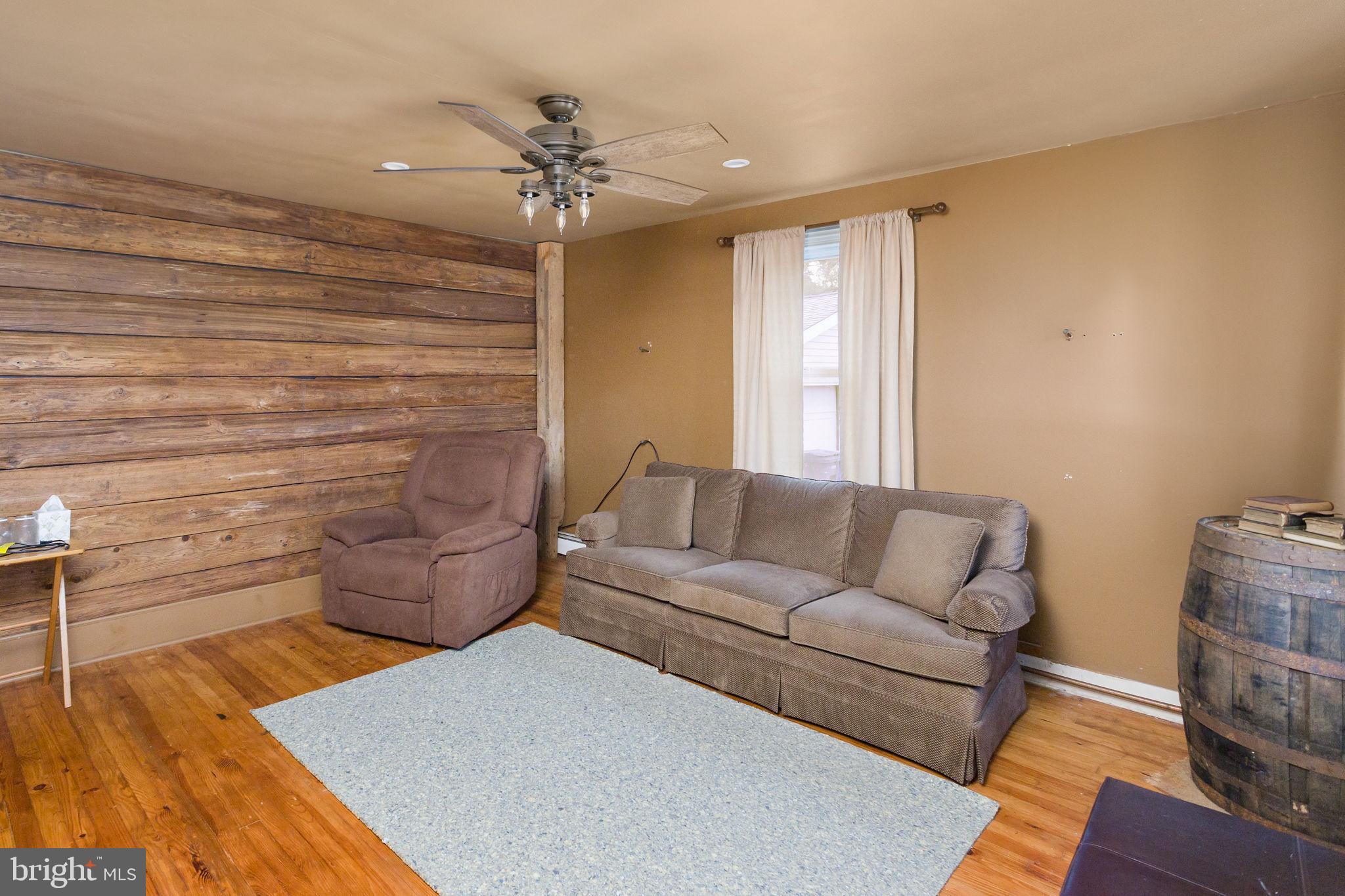 418 Jacobstown Cookstown Road Wrightstown, NJ 08562 - Photo 10 of 30 a living room with furniture and a wooden floor