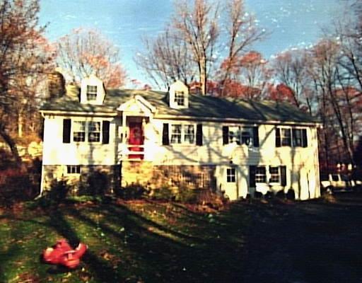 161 Briar Brae Road Stamford, CT 06903 - Photo 1 of 1 a front view of a house with a yard