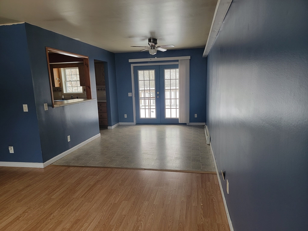 524 South Main Street Orange, MA 01364 - Photo 3 of 19 wooden floor in an empty room with a window