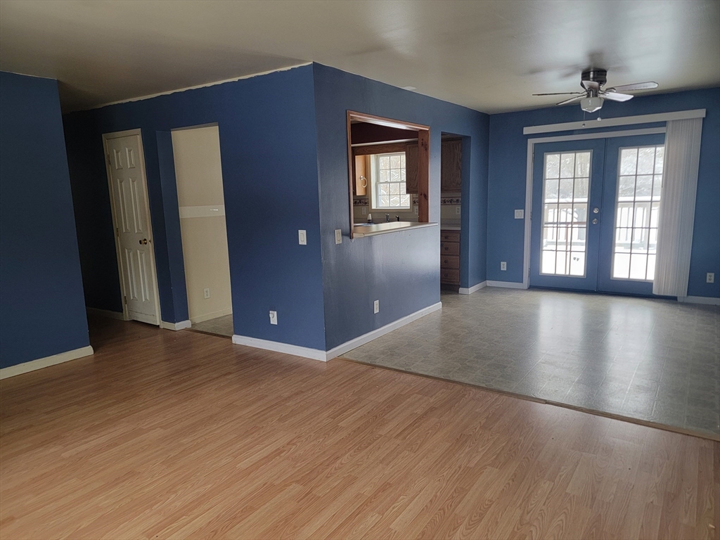 524 South Main Street Orange, MA 01364 - Photo 4 of 19 a view of livingroom with hardwood floor and hallway