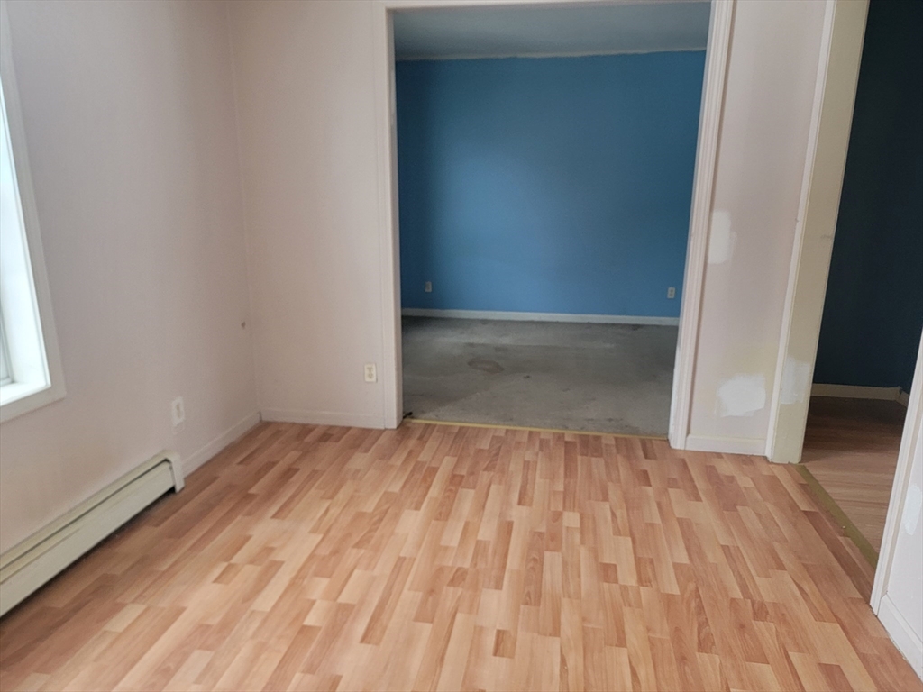 524 South Main Street Orange, MA 01364 - Photo 8 of 19 a view of room with wooden floor