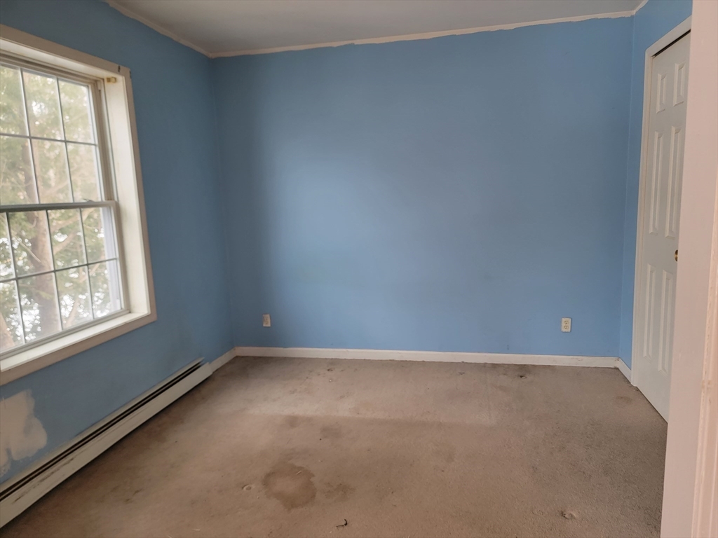 524 South Main Street Orange, MA 01364 - Photo 10 of 19 an empty room with a window